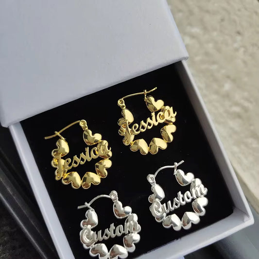 Heart charm earrings